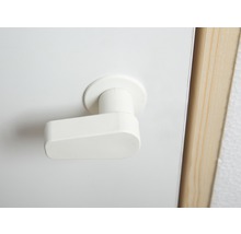 Wit raam handvat op een raam