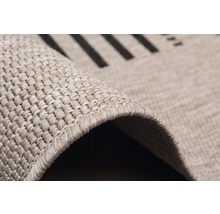 Detailopname van een beige tapijt met streepmotief