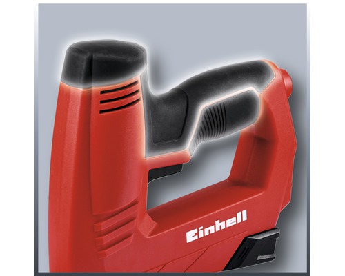 Detailopname van een rode elektrische tacker van het merk Einhell met een zwarte handgreep.