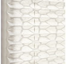 Close-up van een plisségordijn met geometrisch motief