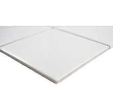 Detailopname van een witte keramische tegel