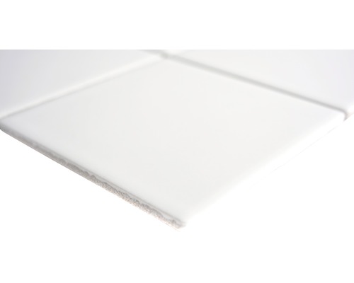 Close-up van witte keramische tegels.