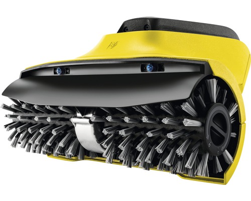 Veegmachine met roterende borstels voor het reinigen van oppervlakken