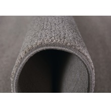 Detailopname van een tapijt met textielstructuur