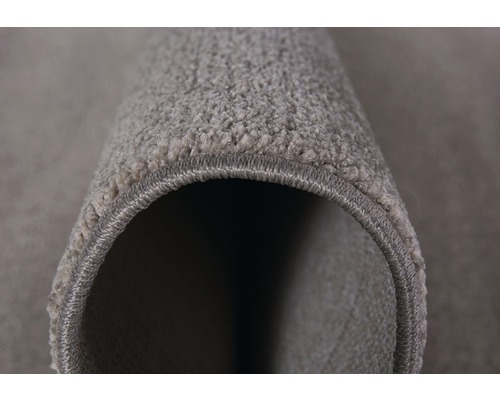 Detailopname van een tapijt met textielstructuur