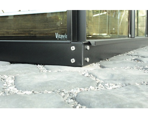 Detailopname kasfundering op straatstenen