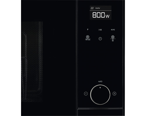 Close-up van een magnetron met digitaal display en bedieningspaneel