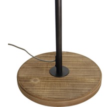 Detailweergave van de voet van een staande lamp van hout en metaal