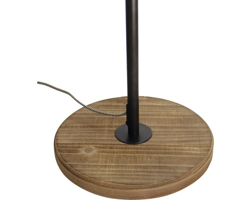 Detailweergave van de voet van een staande lamp van hout en metaal