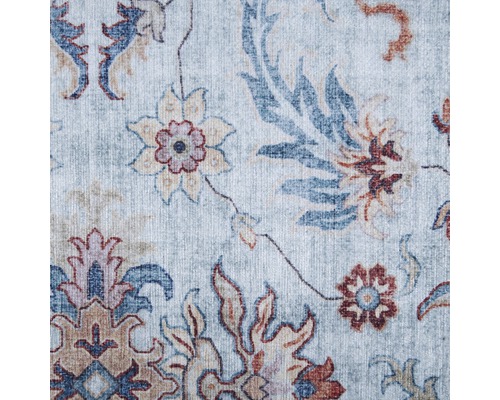 Detailweergave van een tapijt met bloemmotief