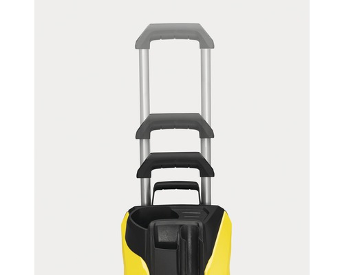 Telescopische handgreep van een gele reinigingsmachine