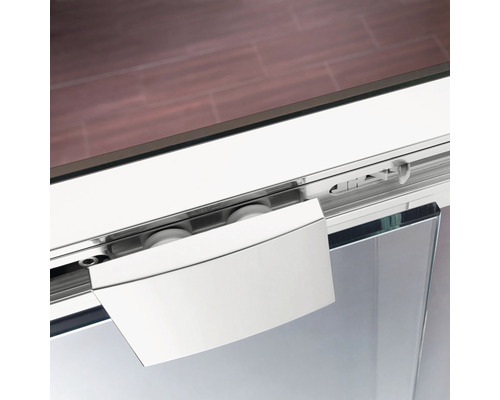 Detail van een schuifdeur met loopwagen en geleiderail