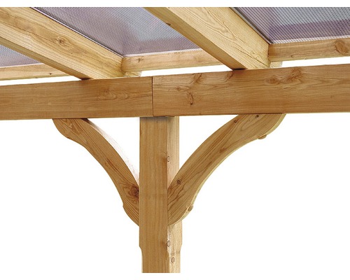 Detailopname van een houten constructie met balken en een doorzichtig dak