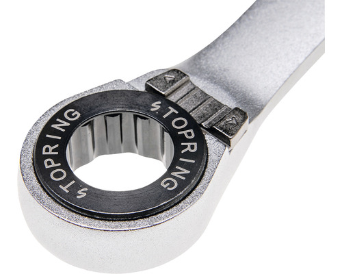 Close-up van een ringsleutel met het opschrift S. TOPRING