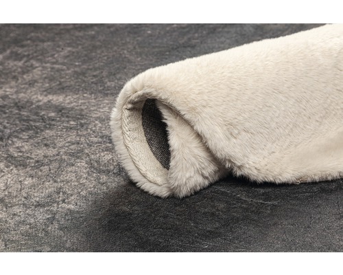 Opgerolde vloerkleed