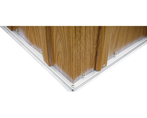 Detailopname van een hoekverbinding van wandpanelen met veer en groef