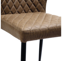 Gedetailleerd aanzicht van een stoel met een bruine, gewatteerde bekleding en zwarte poten