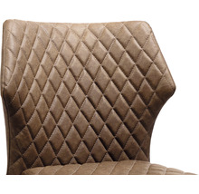 Detailopname van een stoel met ruitpatroon