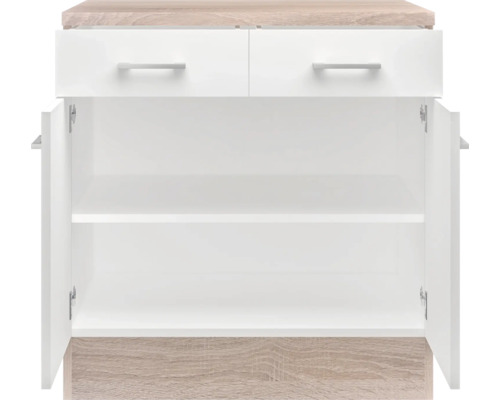 Witte onderkast met twee laden en open deuren.