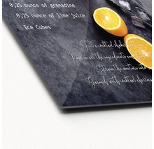 Glasfoto met cocktailrecept en sinaasappelschijfjes