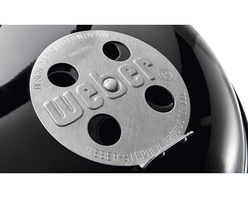 Detailopname van de Weber grill ventilatieschuif