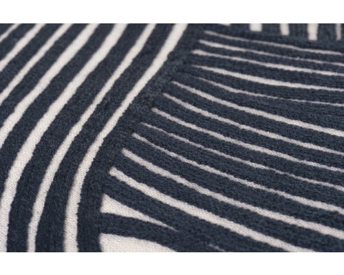 Close-up van een tapijt met grafisch streepmotief