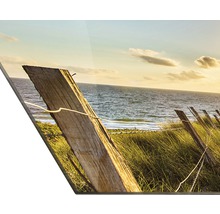 Decoratieve muurdecoratie met kustmotief en houten hek