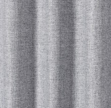 Close-up van een gordijn met geweven textuur en patroon