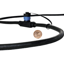 Druppelslang met regelventiel en Euro cent munt