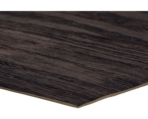 Detailopname van een vinyl vloerplaat met houtlook.