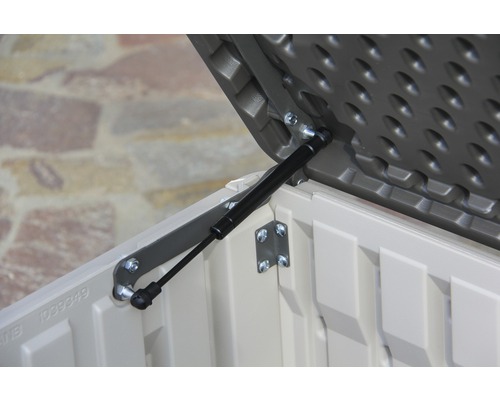 Detailopname van een geopende tuinkist met gasveer