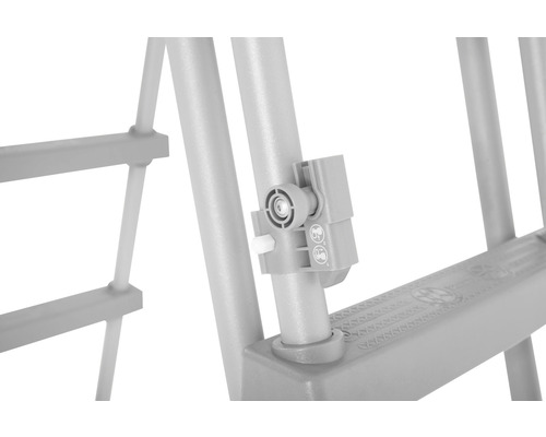 Detail van een kinderbeveiliging op een kinderbed