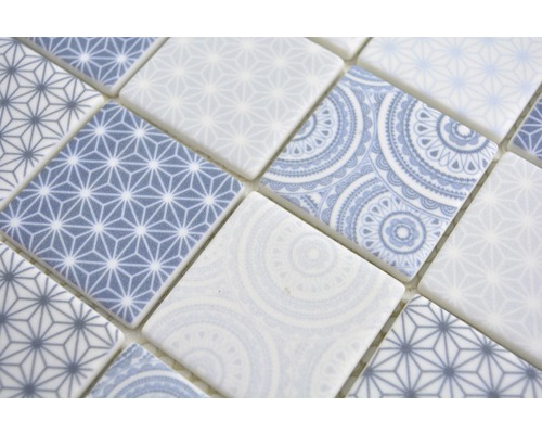 Mozaïektegels met geometrische en bloemmotieven