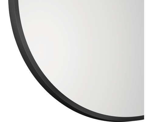 Detail van een ronde spiegel met frame