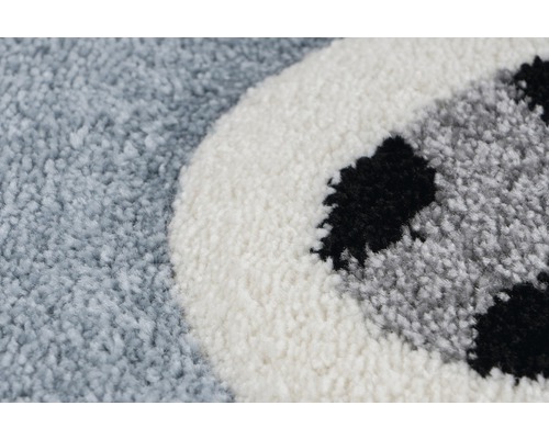 Detailweergave van een tapijt met voetbalpatroon