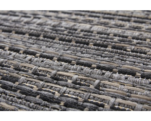 Close-up van een geweven tapijt met textuur