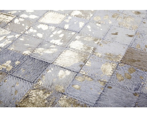 Vierkant vloerkleed van echt leer, samengesteld uit afzonderlijke stukken