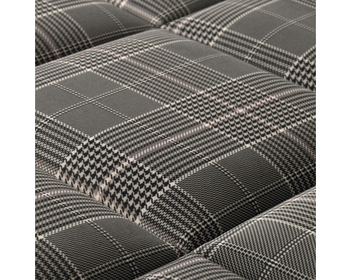 Close-up van gestoffeerd meubilair met ruitpatroon