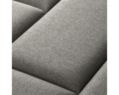 Close-up van een grijs bankkussen.