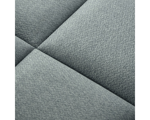 Close-up van een gestructureerd, gestoffeerd meubelstuk