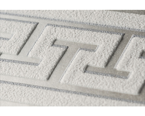 Close-up van een wit behang met geometrisch patroon