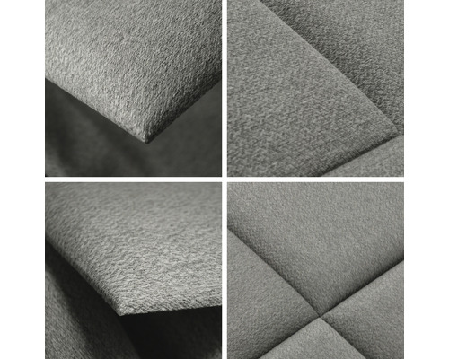 Detailopname van een grijze, gewatteerde meubelbekleding.