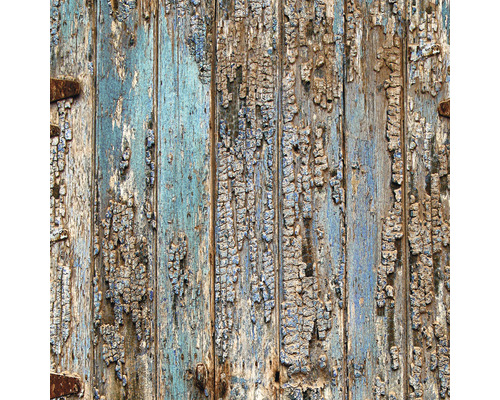 Close-up van een oude houten deur met afbladderende verf