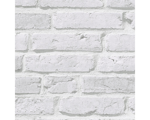 Close-up van een behang met baksteenmotief.