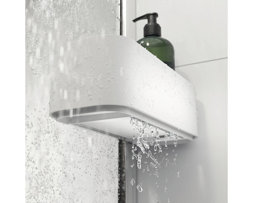 Witte doucheplank met water en zeepdispenser