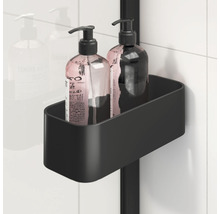 Zwart douche rek met twee zeepdispensers op een douchewand.