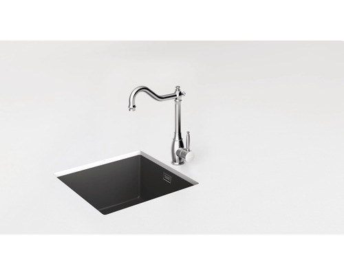 Spoeltafelkraan naast een gootsteen