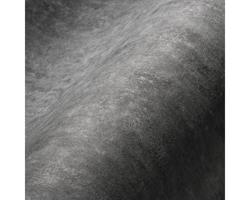 Close-up van een grijs structuurbehang met betonlook