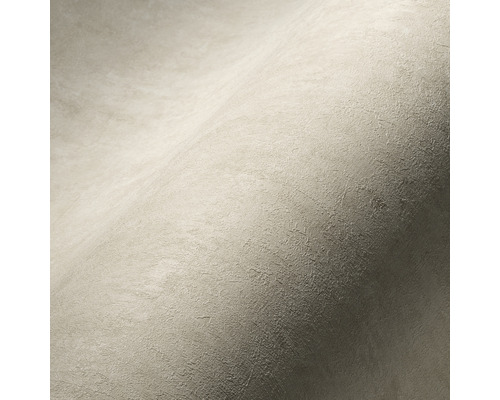 Close-up van een beige structuur behang.