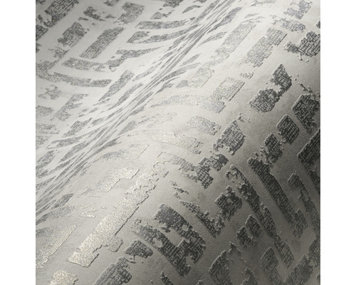 Close-up van een gestructureerd behang met een geometrisch patroon